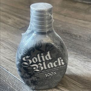 Millennium Solid Black 100X Ultra Advanced Bronzer - Black